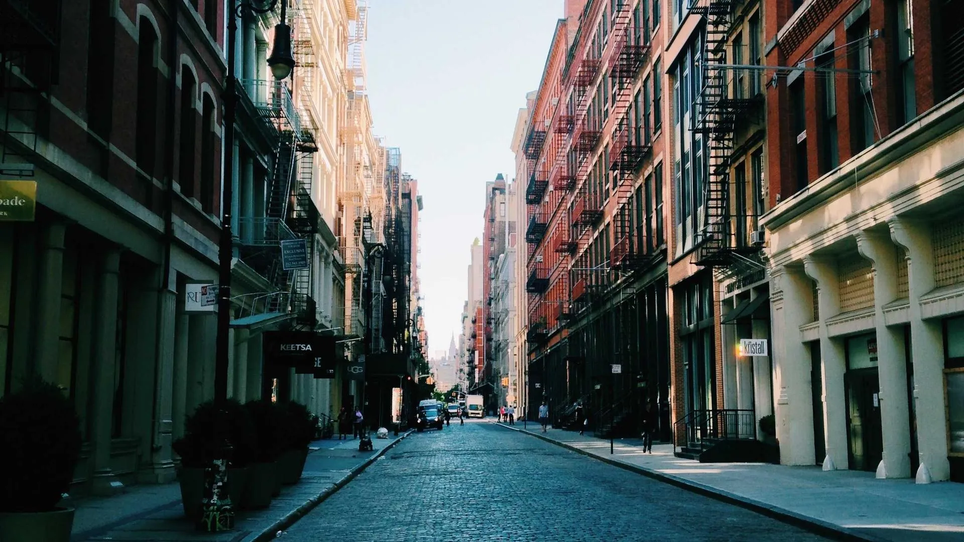 Cast-iron buildings and fire escapes on a New York City street